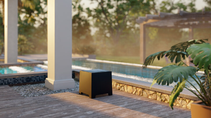 Coastal Source CUBE outdoor subwoofer on a patio
