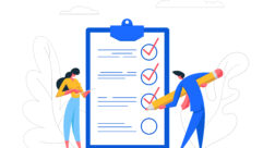 Two people working on a checklist