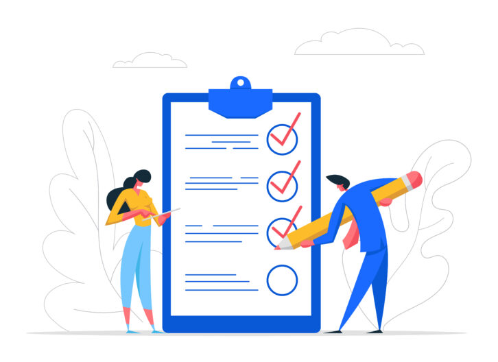 Two people working on a checklist