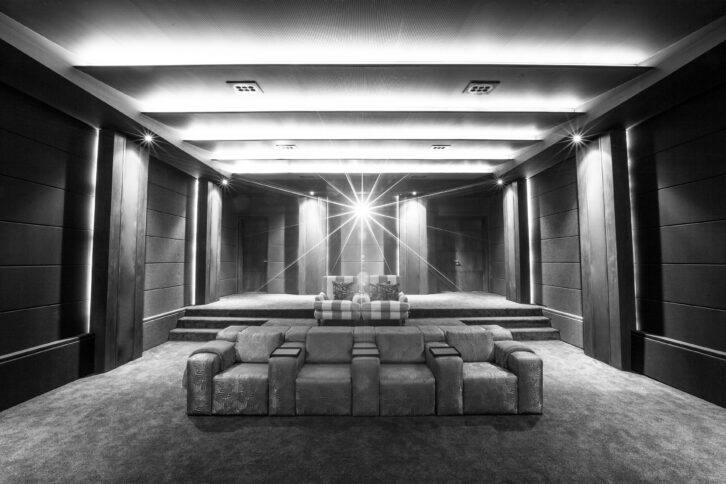 A Cinema Lusso home theater in black and white
