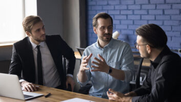 Meeting between three people